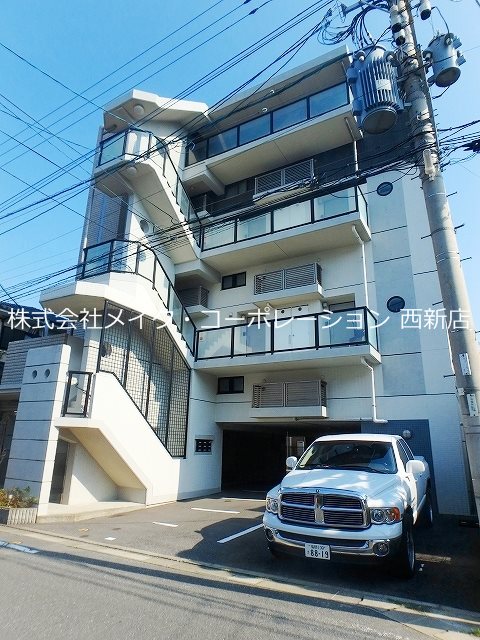 福岡市西区姪浜駅南のマンションの建物外観