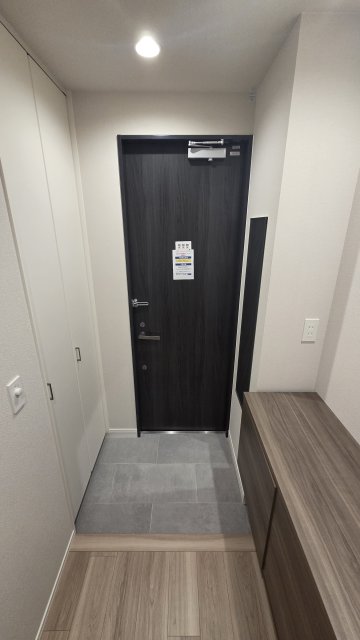 WING TOWA MAISONの玄関写真
