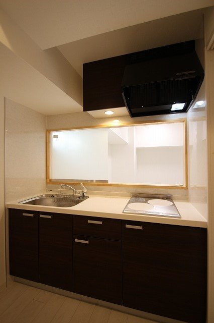 キッチン　同物件、別号室の写真