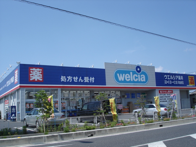 ドラックストア　ウエルシア草加金明店（ドラッグストア）まで364m