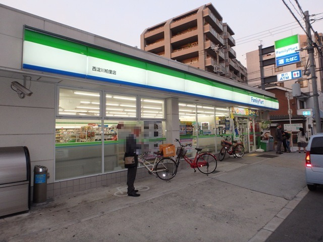 コンビニ　ファミリーマート 西淀川柏里店（コンビニ）まで430m