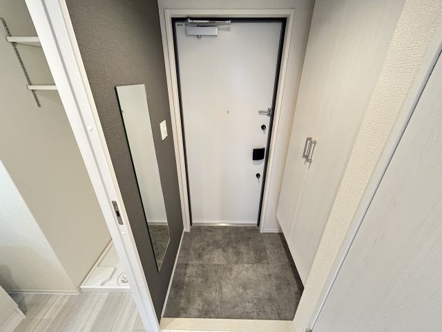 ファーストフィオーレ塚本ウェルビングの玄関写真