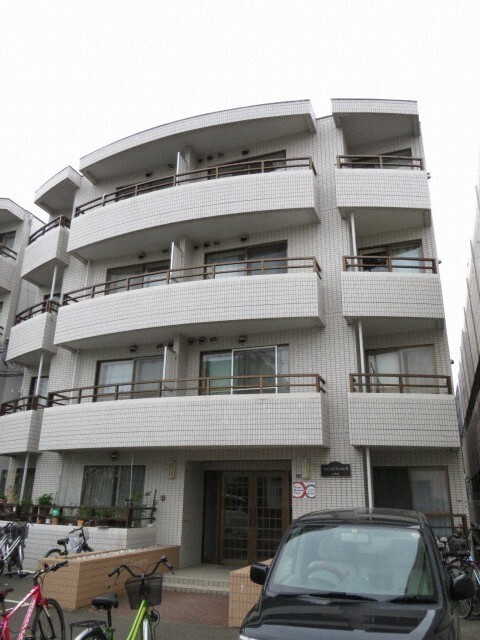 札幌市北区北二十一条西のマンションの建物外観
