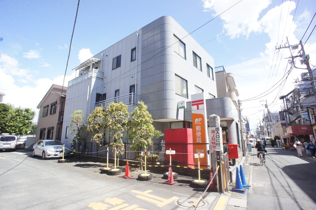 郵便局　稲田堤郵便局（郵便局）まで593m