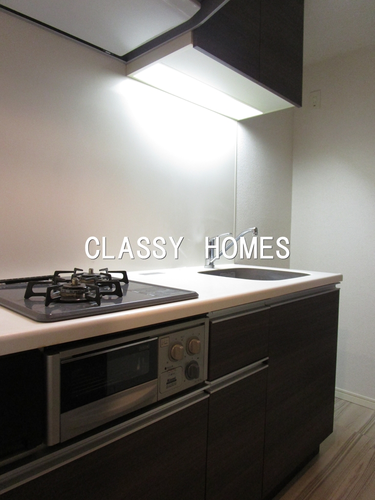 キッチン　2013年竣工デュアレス愛宕虎ノ門：グリル付システムキッチン