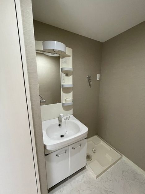 洗面設備　同物件内別部屋のお写真になります