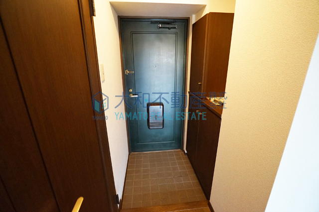 クレスト福間駅前の玄関写真