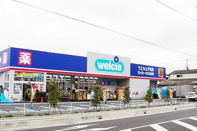 ドラックストア　ウエルシア草加金明店（ドラッグストア）まで170m
