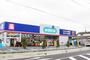 ドラックストア　ウエルシア草加金明店（ドラッグストア）まで170m