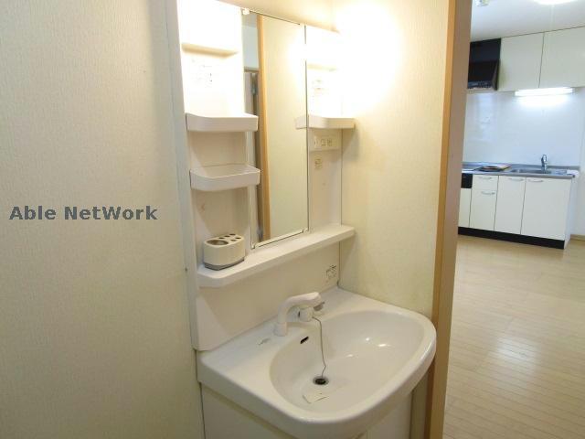 【釧路市貝塚のアパートの洗面設備】