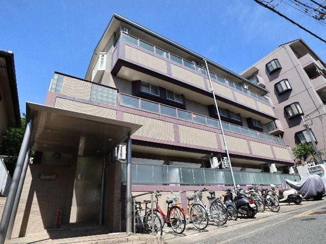 【奈良市あやめ池南のマンションの建物外観】