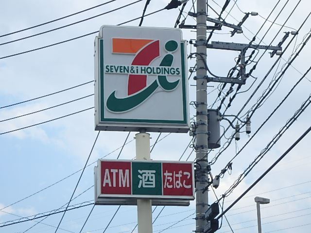 コンビニ　セブンイレブン（コンビニ）まで210m