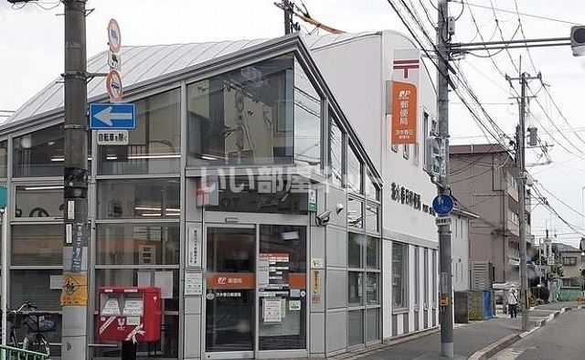 郵便局　茨木春日丘郵便局（郵便局）まで595m