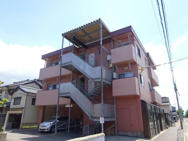 新潟市中央区鐙西のマンションの建物外観