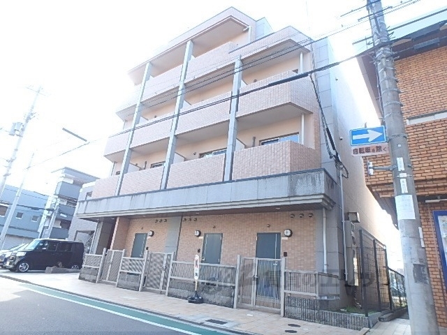 京田辺市河原食田のマンションの建物外観