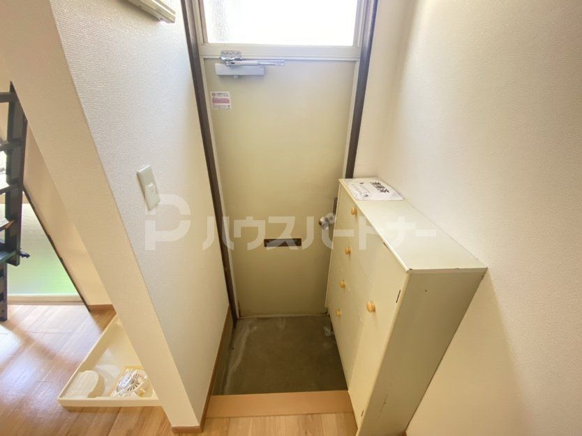 明信コーポの玄関写真
