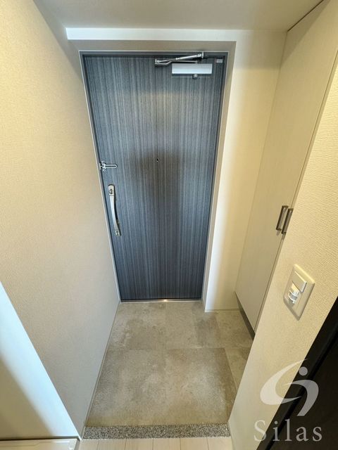 地下鉄四つ橋線 住之江公園駅 徒歩3分 15階建 築2年の玄関写真