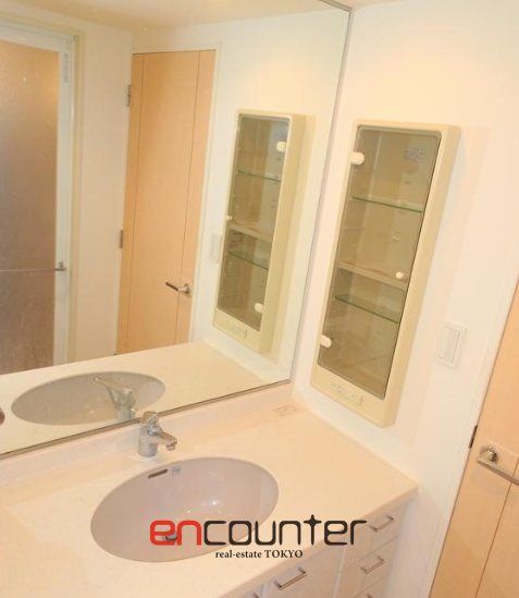 洗面設備　※同マンション別室参考写真