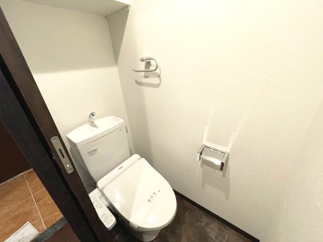 トイレ　同マンション同間取り他部屋の写真