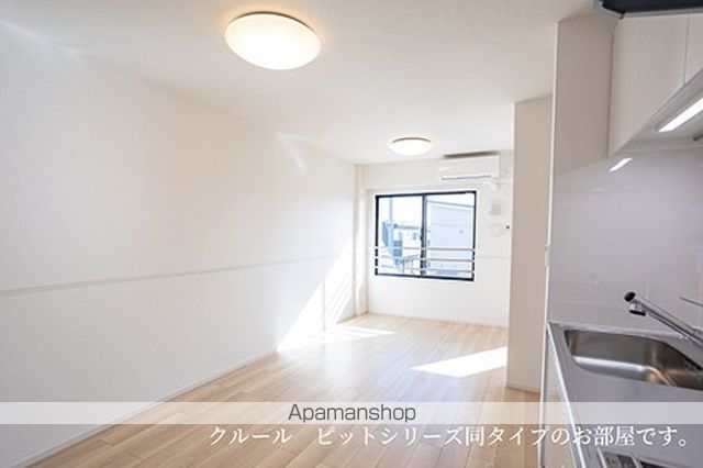 藤光町1丁目アパート IIIの居間写真