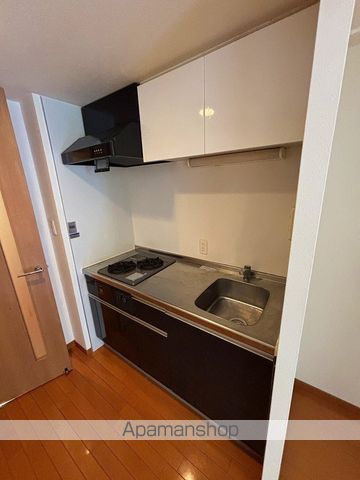 箕面市 10階建 築18年のキッチン写真