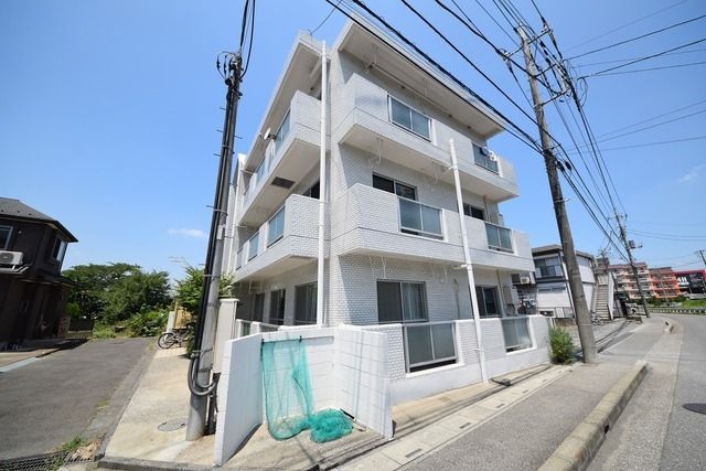 狭山市入間川のマンションの建物外観