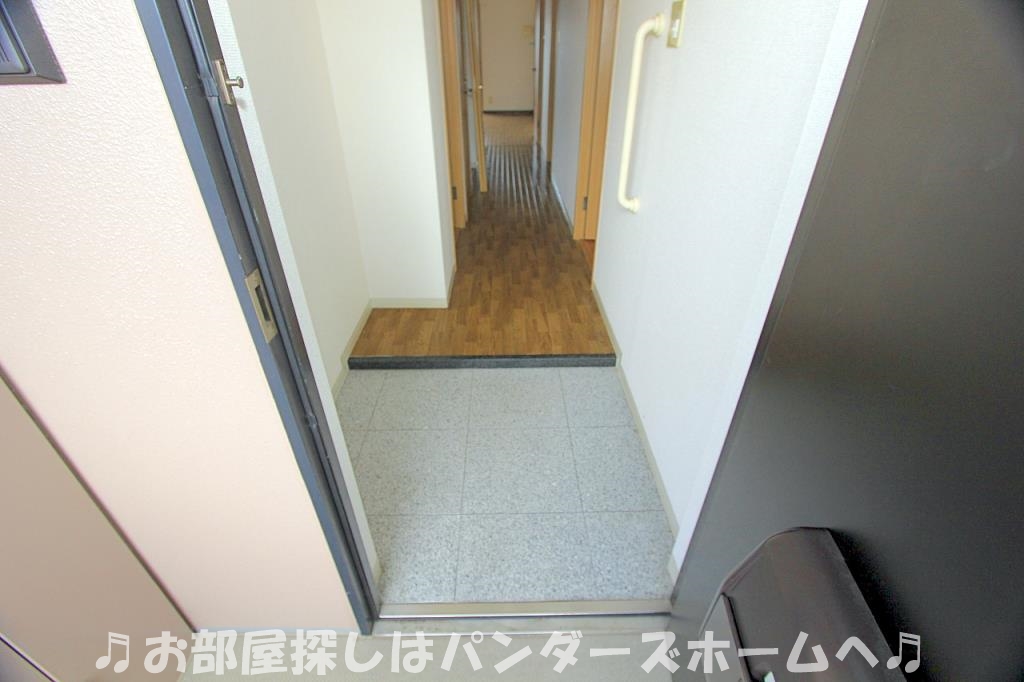 シャルムくずはの玄関写真