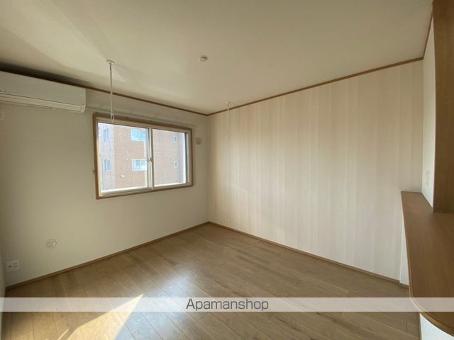 コンフォール常盤台Bの居間写真