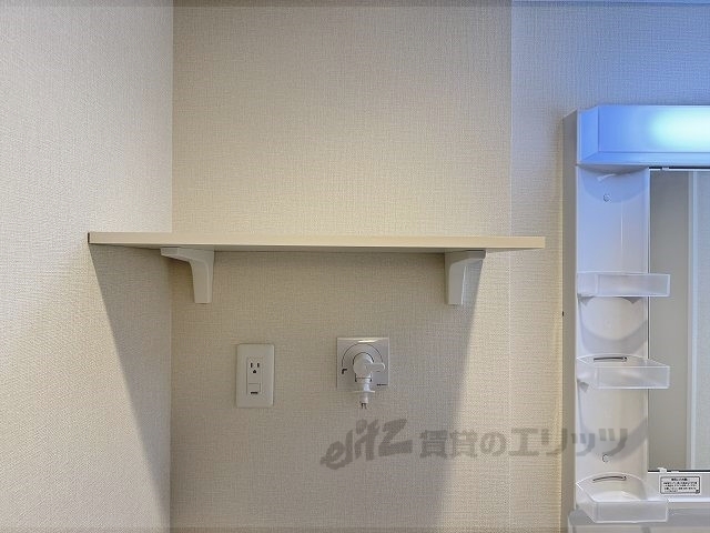 収納　洗濯機置き場上