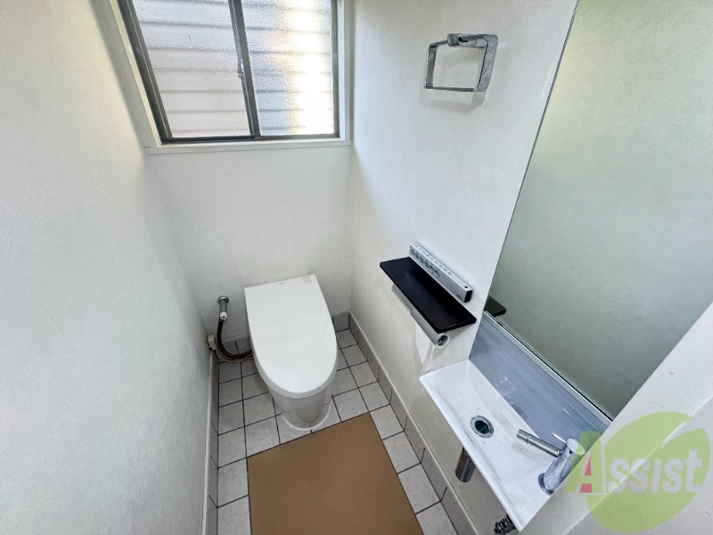 鶯町1丁目 戸建 北棟のトイレ写真