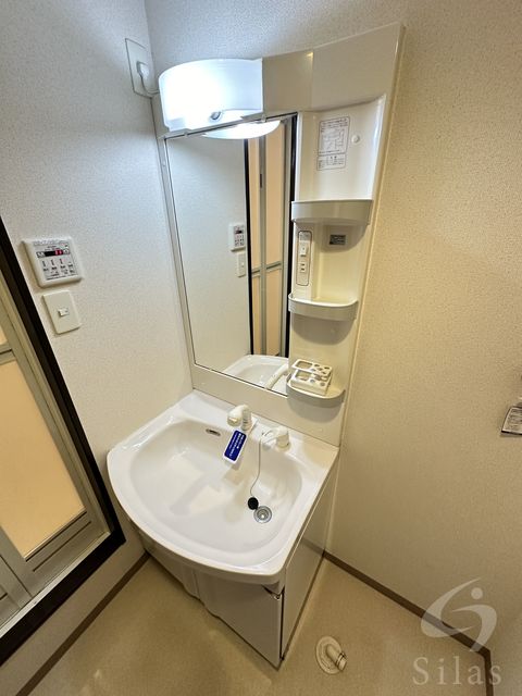 ＪＲ東海道本線 千里丘駅 徒歩10分 3階建 築15年の内装写真