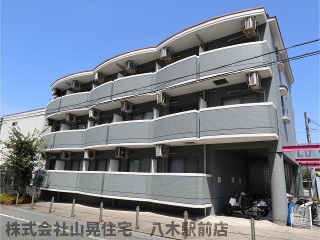 【橿原市久米町のマンションの建物外観】