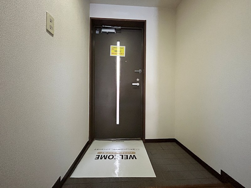 プラザハイツ二ツ屋A棟の玄関写真