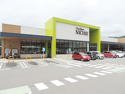 スーパー　フードグランニチエー三成店（スーパー）まで1051m