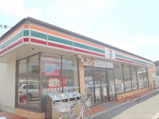 コンビニ　セブンイレブン久御山市田店（コンビニ）まで450m
