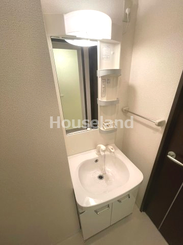 洗面設備　落ち着いた色調のトイレです