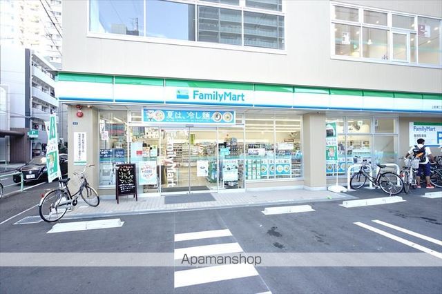 コンビニ　ファミリーマート（コンビニ）まで438m