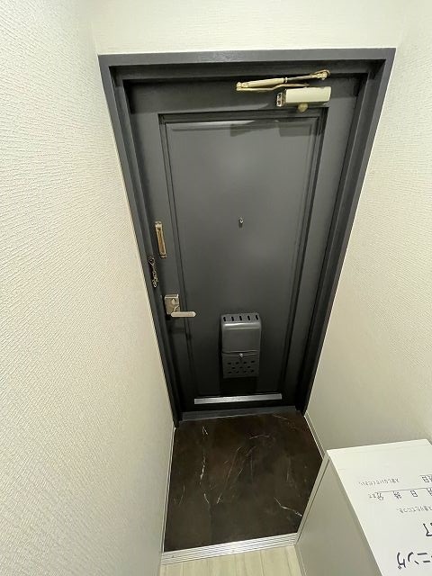 【大阪市淀川区塚本のマンションの玄関】