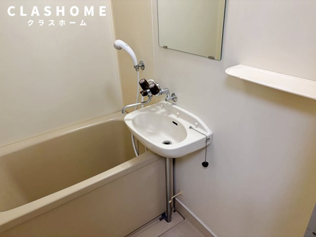 洗面設備　同物件の別部屋になります。