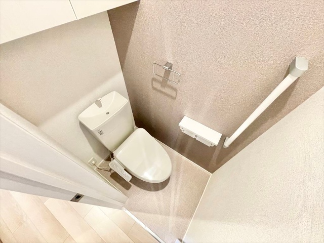 トイレ　ニューデフィシリーズ同タイプの内装写真