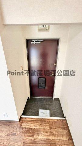 地下鉄御堂筋線 大国町駅 徒歩9分 5階建 築37年の玄関写真