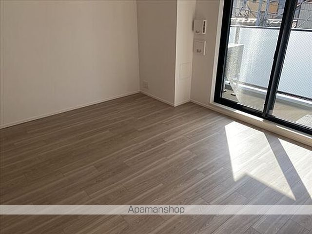 プラウドフラット月島アベニューの居間写真