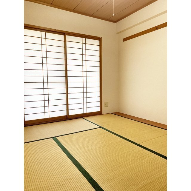 ライオンズマンション金沢此花町の居間写真