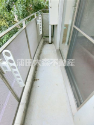 バルコニー　西向き物干し金具付きのバルコニー