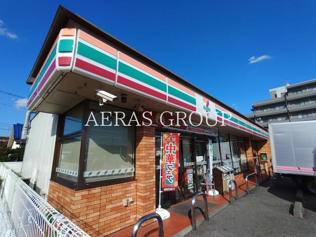 コンビニ　セブン-イレブン 日野税務署前店（コンビニ）まで422m