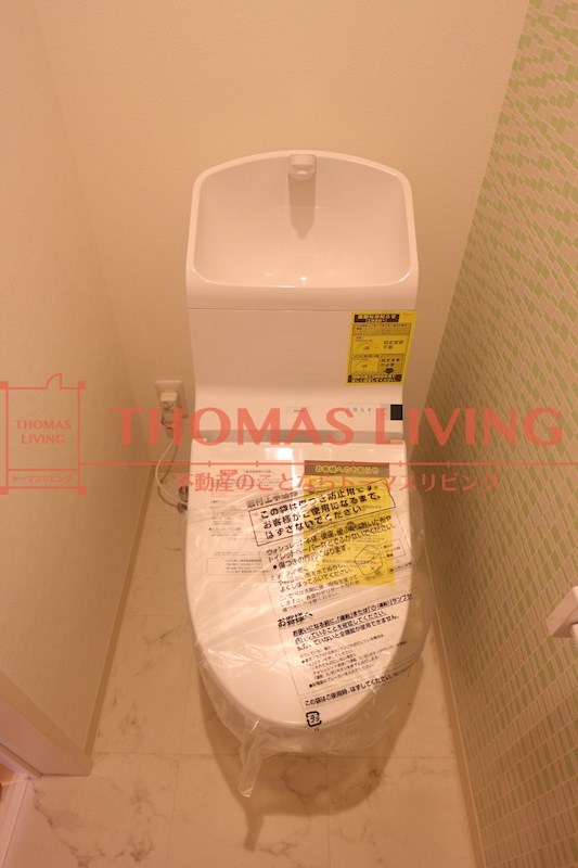 トイレ　ウォシュレット・温水便座。