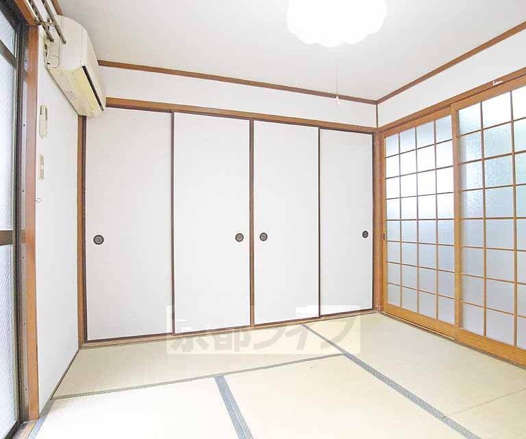 京福電鉄北野線 北野白梅町駅 徒歩15分 3階建 築40年の居間写真