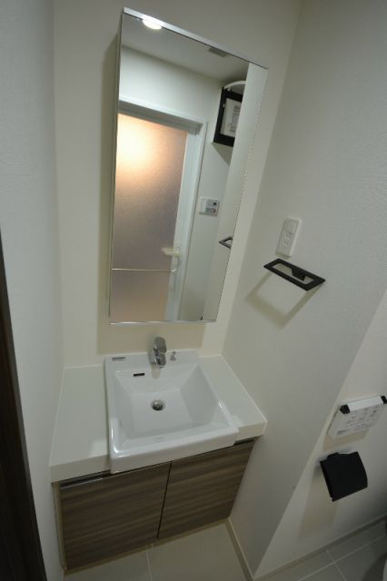 洗面設備　※別部屋の参考写真です。