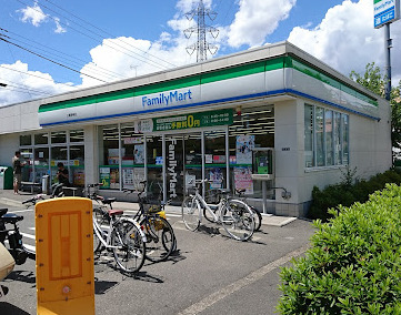 コンビニ　ファミリーマート 三鷹野崎店（コンビニ）まで573m
