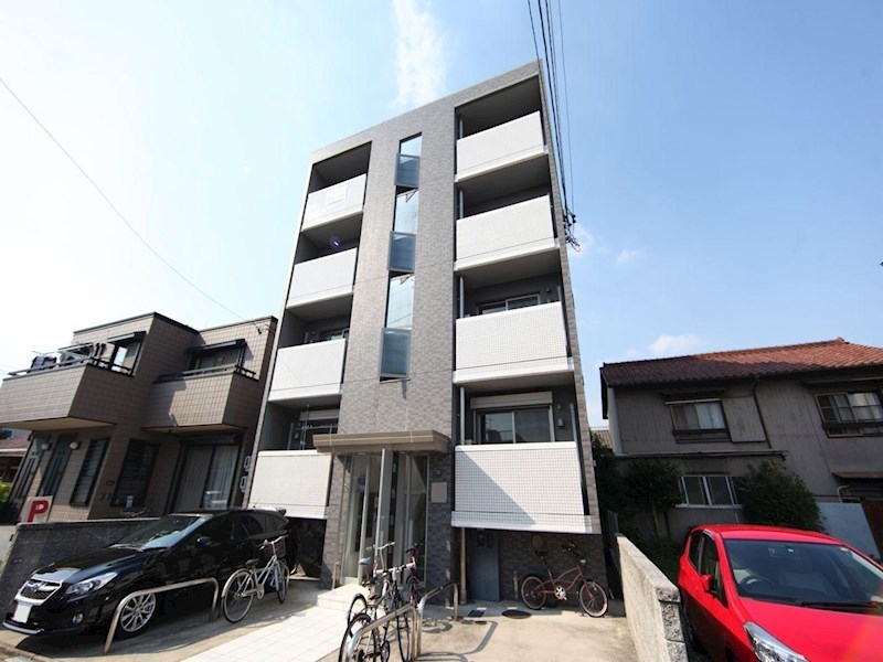 建物外観　外観　デザイナーズ　外壁タイル張り　敷地内平面駐車場